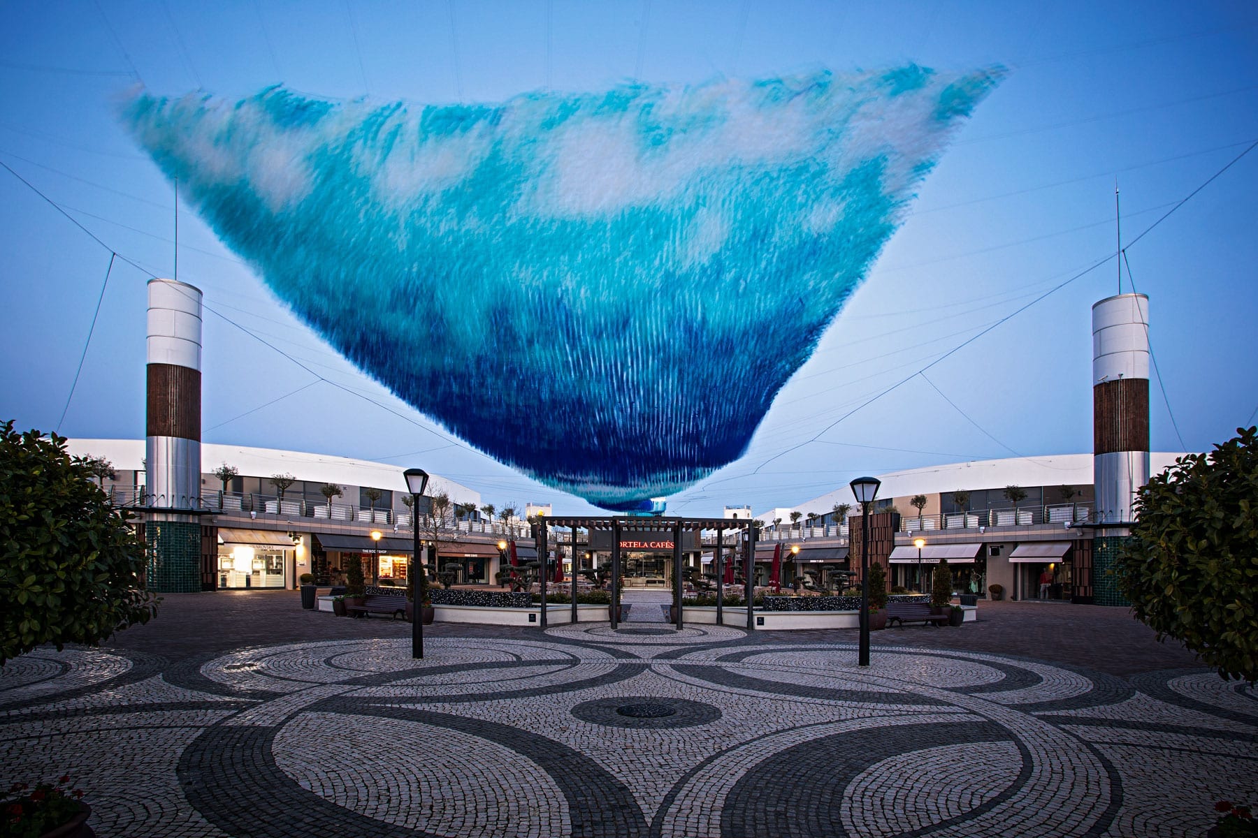 Dream Waves part of Patrick Shearn of Poetic Kinetics Skynet Series floats in the sky like waves.
